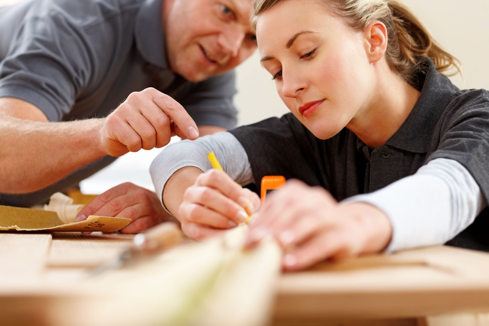 Two carpenters working together